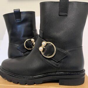 Stuart Weitzman ankle boots with pearl detail.